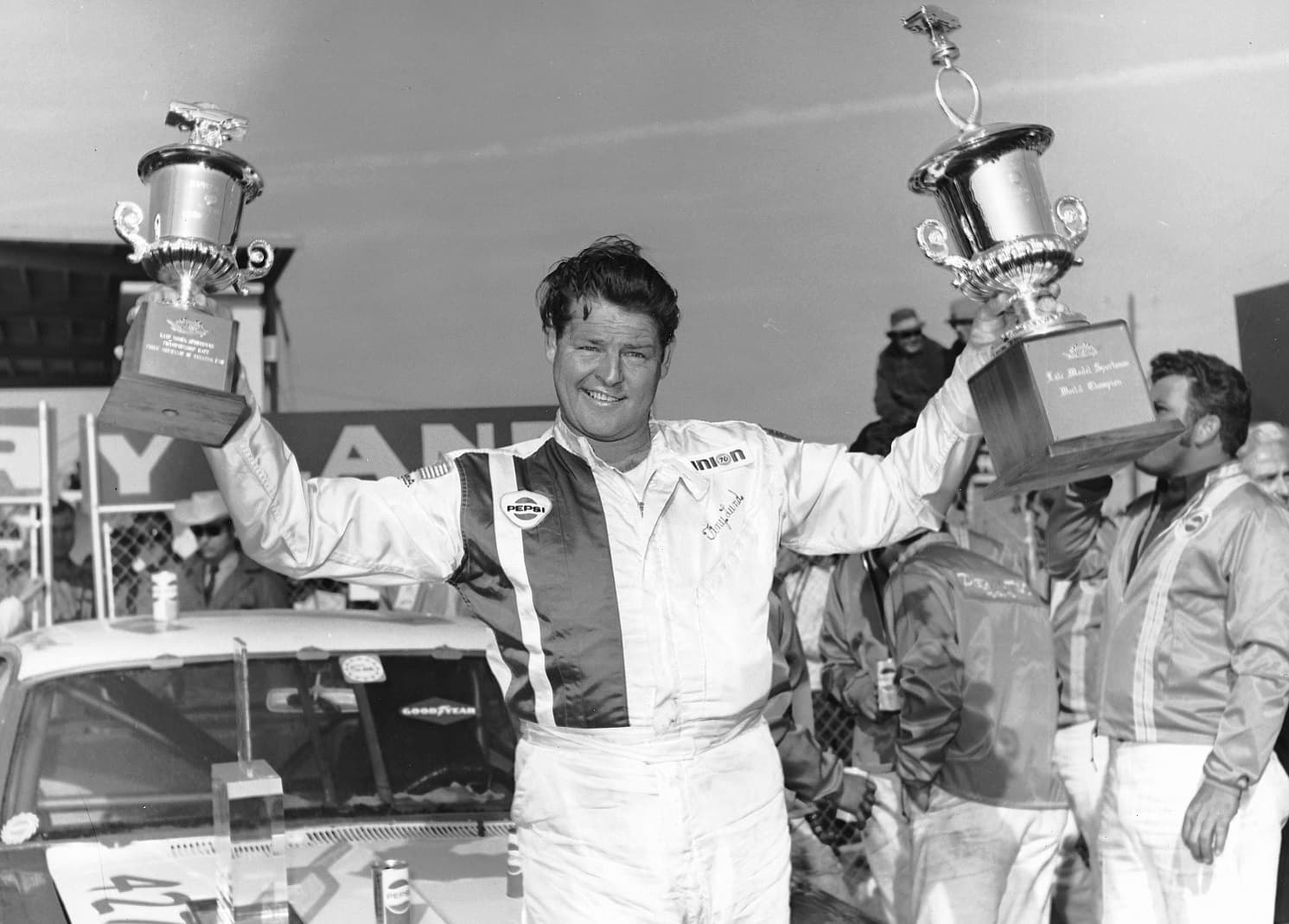 Tiny Lund in Victory Lane after he drove Bondy Long's Ford Fairlane to victory in the Permatex 300 at Daytona International Speedway for Late Model Sportsman cars.