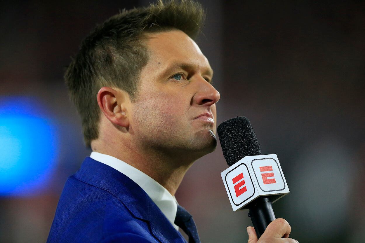 Todd McShay looks on during a college football game.