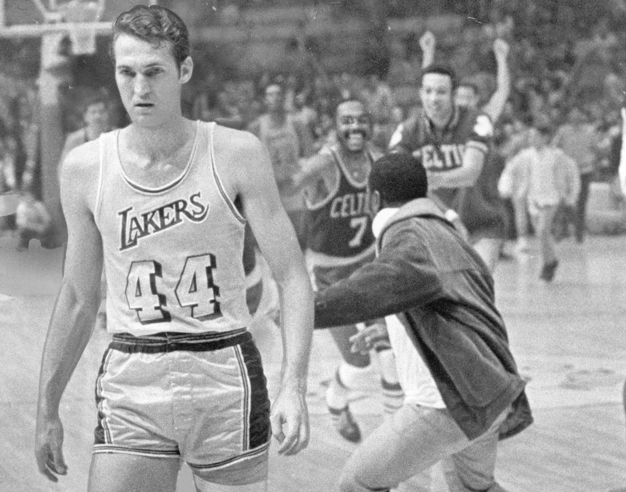 Jerry West of the Los Angeles Lakers walks off the court.