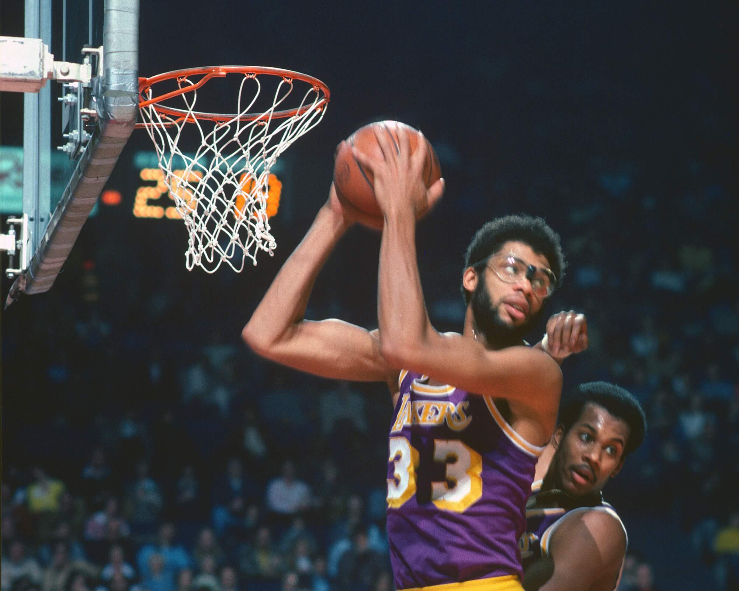 Kareem Abdul-Jabbar of the Los Angeles Lakers pulls down a rebound.