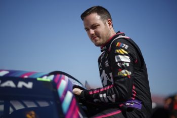 Alex Bowman enters his car during qualifying for the NASCAR Cup Series GEICO 500 at Talladega Superspeedway on April 22, 2023.