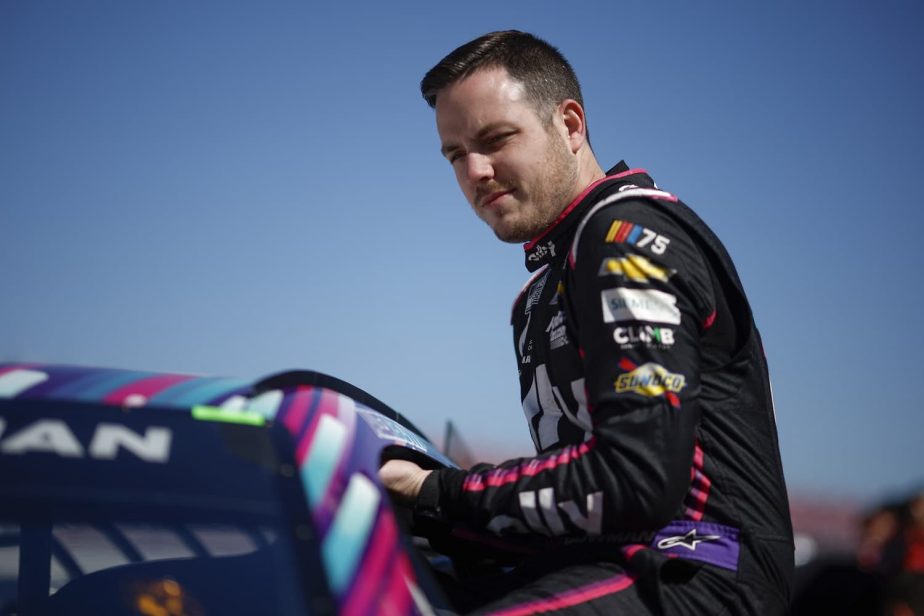 Alex Bowman enters his car during qualifying for the NASCAR Cup Series GEICO 500 at Talladega Superspeedway on April 22, 2023.