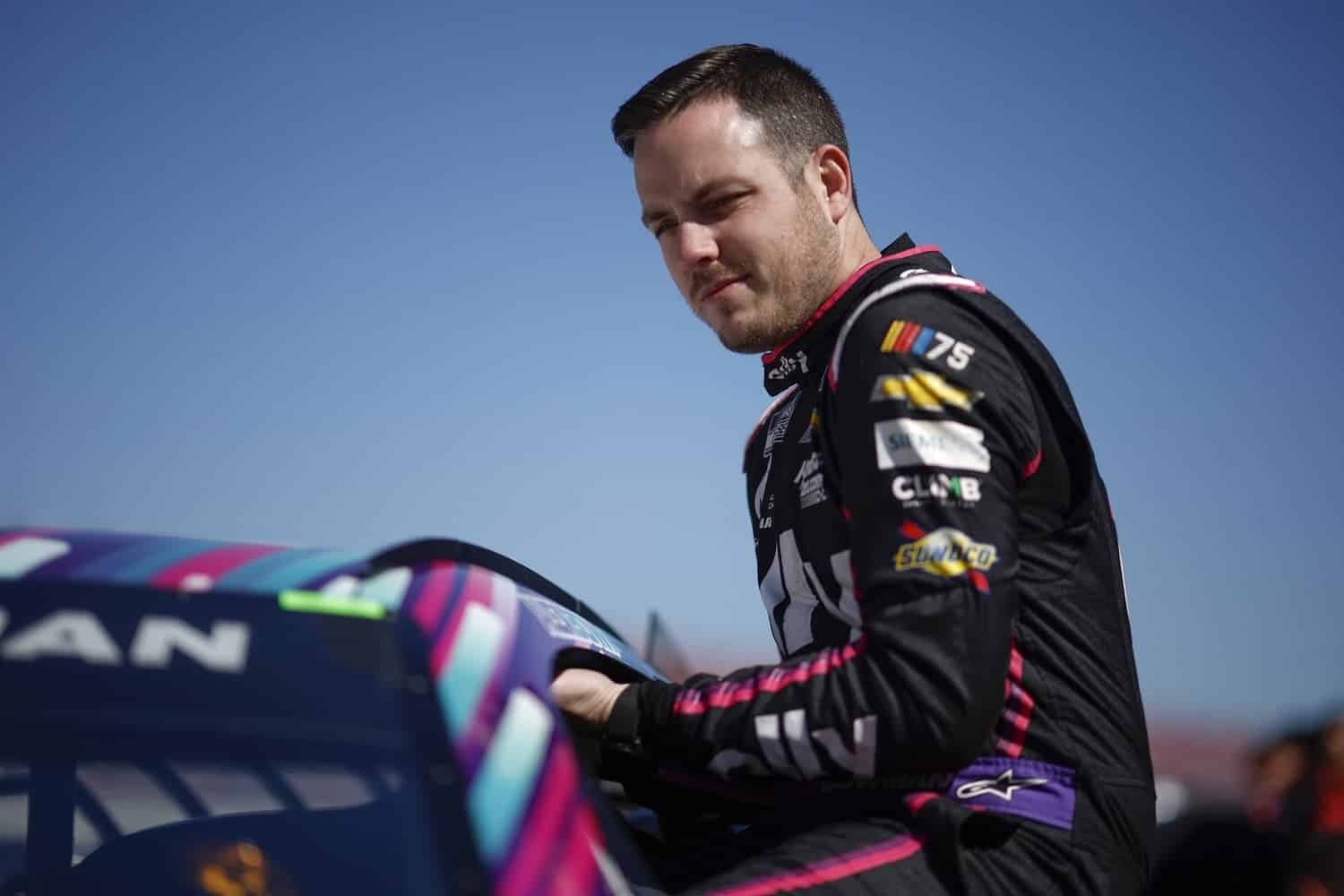 Alex Bowman enters his car during qualifying for the NASCAR Cup Series GEICO 500 at Talladega Superspeedway on April 22, 2023.