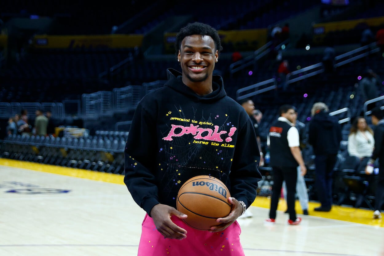 Bronny James poses at Crypto.com Arena.