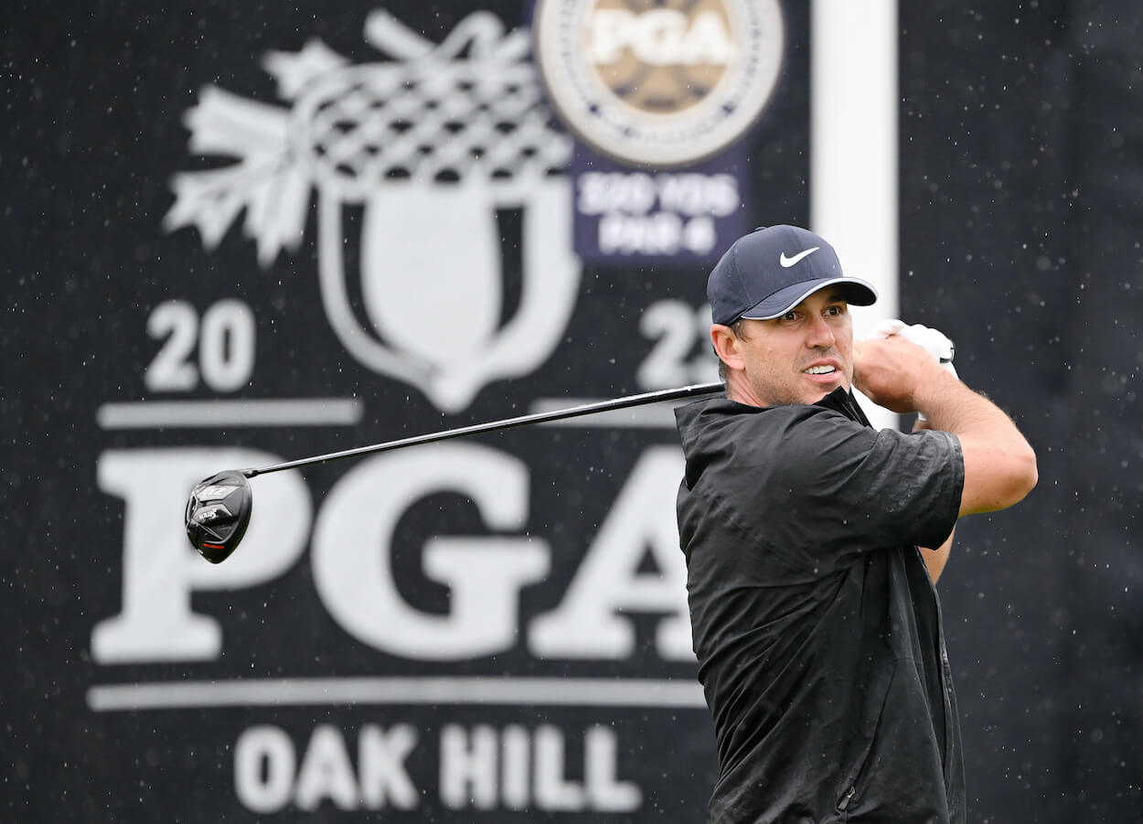Brooks Koepka tees off during the third round of the 2023 PGA Championship.
