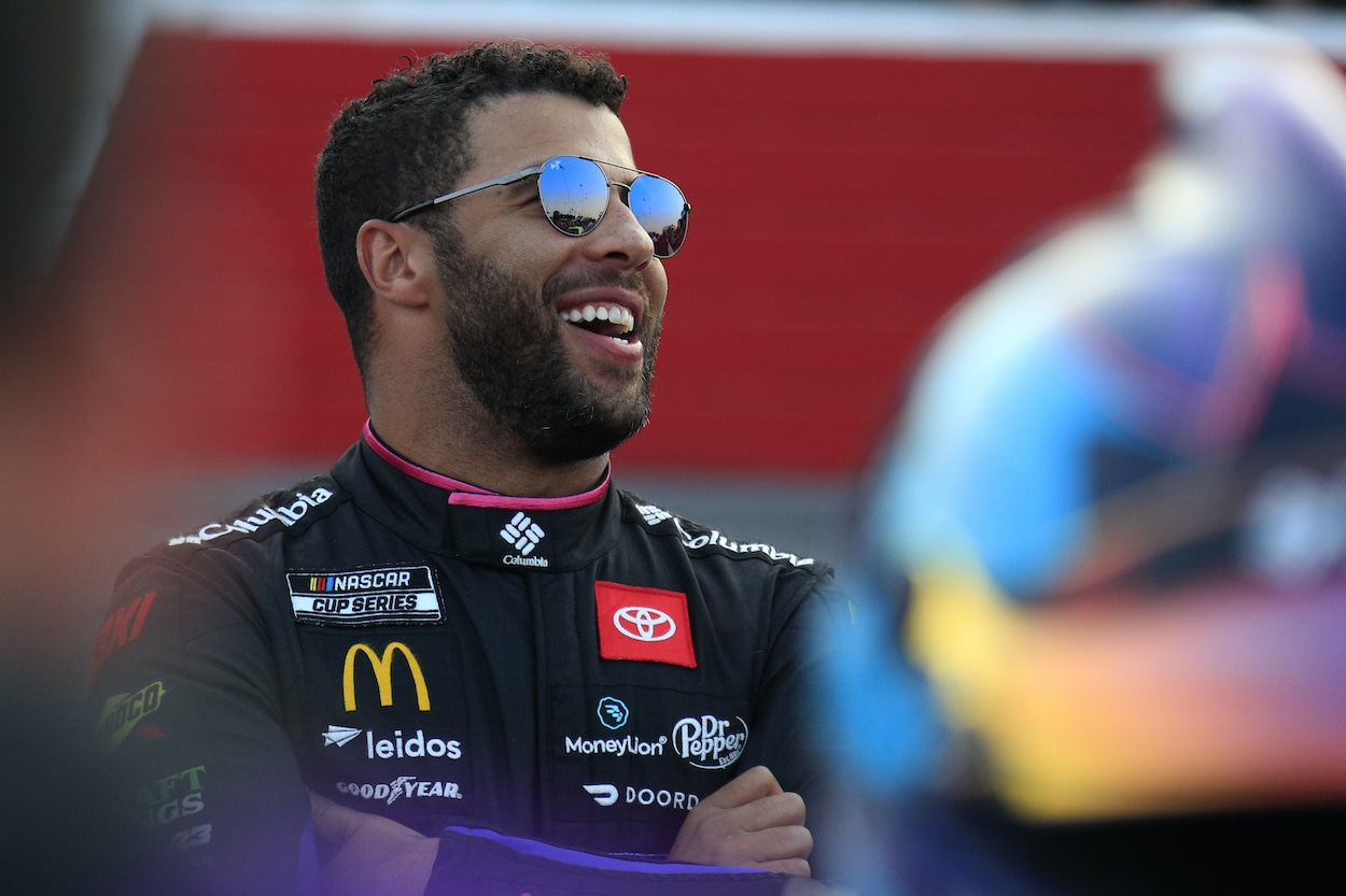 Bubba Wallace talks to crew.