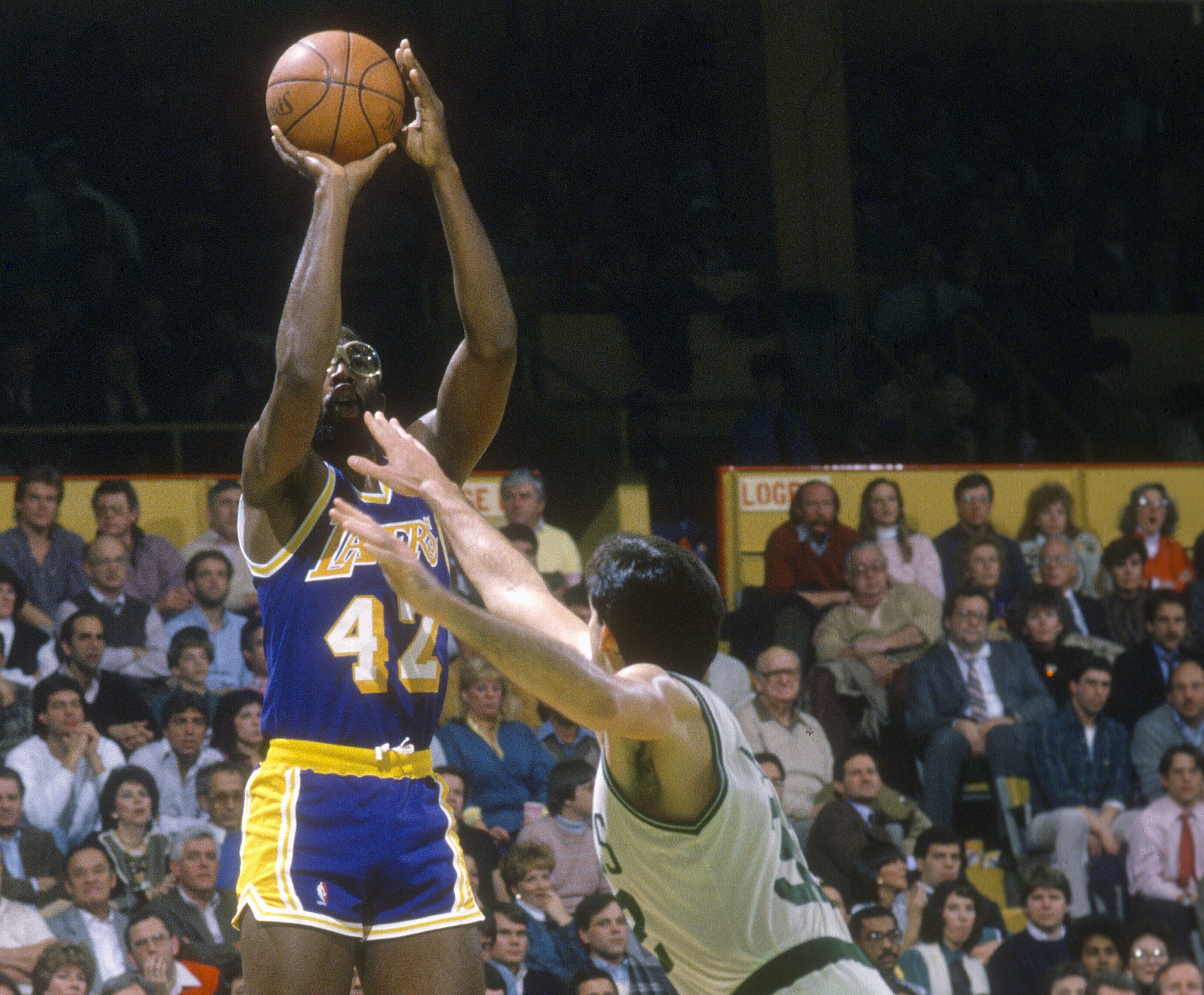 James Worthy of the Los Angeles Lakers shoots over Kevin McHale of the Boston Celtics.