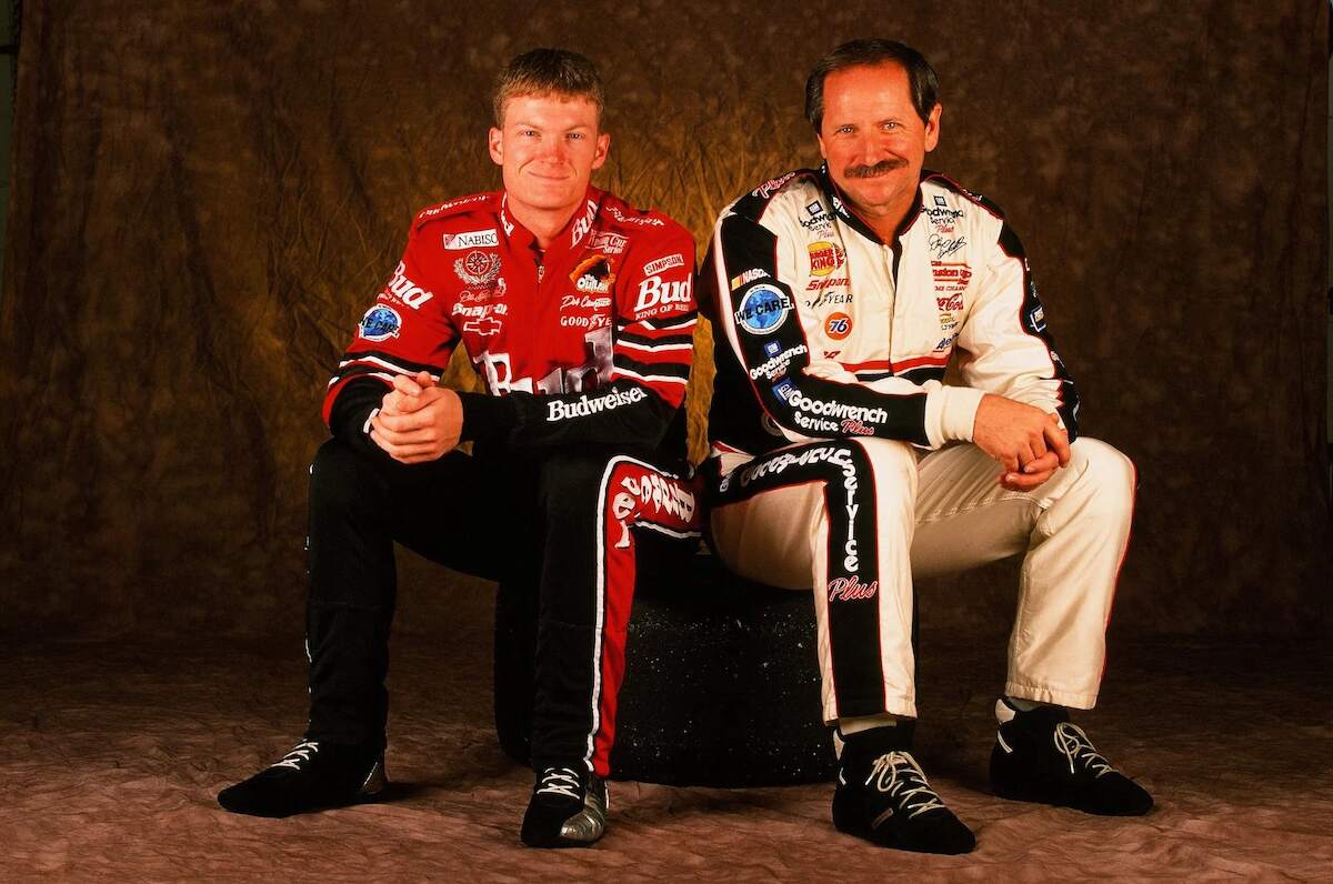 Son Dale Earnhardt Jr. and father Dale Earnhardt Sr. sit together for a photoshoot