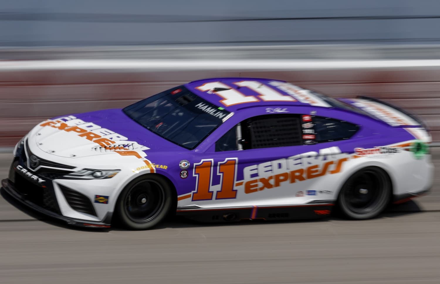 Denny Hamlin, driver of the No. 11 FedEx Toyota, drives during practice for the NASCAR Cup Series Goodyear 400 at Darlington Raceway on May 13, 2023.