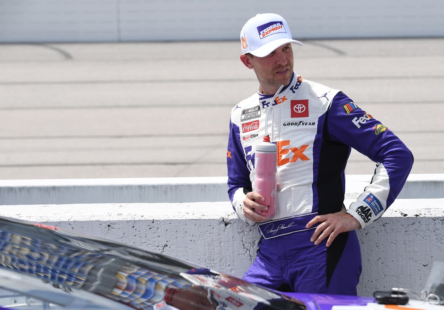 Denny Hamlin looks on during qualifying for the Goodyear 400 on May 13, 2023, at Darlington Raceway.