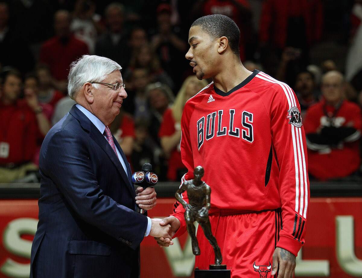Derrick Rose of the Chicago Bulls accepts the NBA MVP Trophy from Commissioner David Stern in 2011