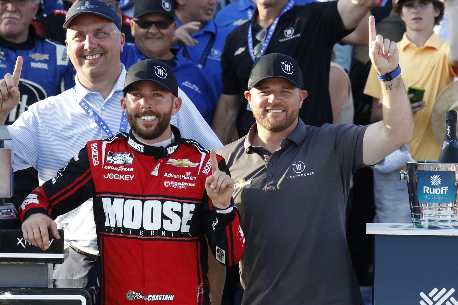 Ross Chastain poses in Victory Lane with team co-owner Justin Marks after winning the NASCAR Cup Series Geico 500 on April 24, 2022, at Talladega SuperSpeedway.