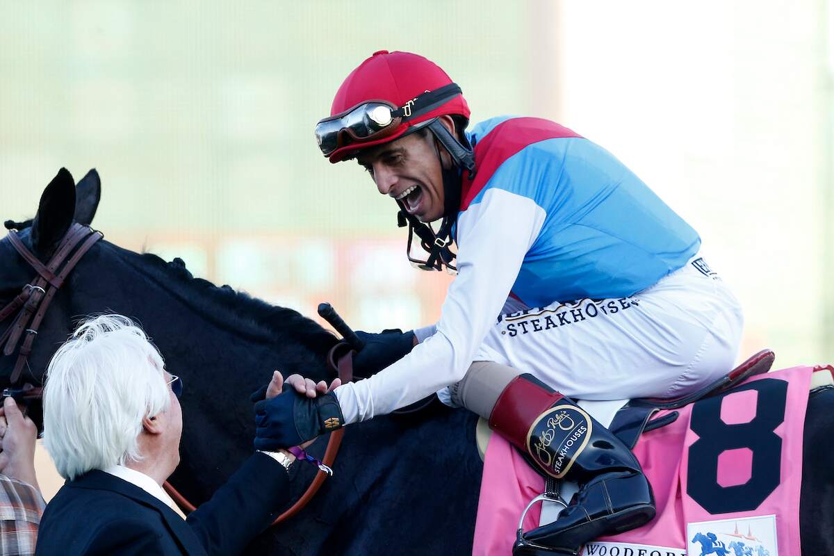 Jockey John Velazquez is congratulated by trainer Bob Buffet after riding Median Spirit to victory at the 147th running of the Kentucky Derby on May 01, 2021 at Churchill Downs