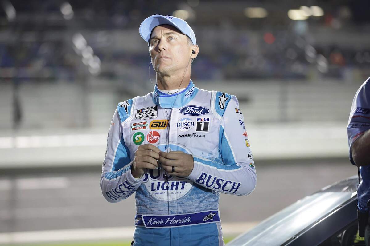 NASCAR driver Kevin Harvick puts on his headphones during qualifying for the Daytona 500 on February 16, 2022 at Daytona International Speedway