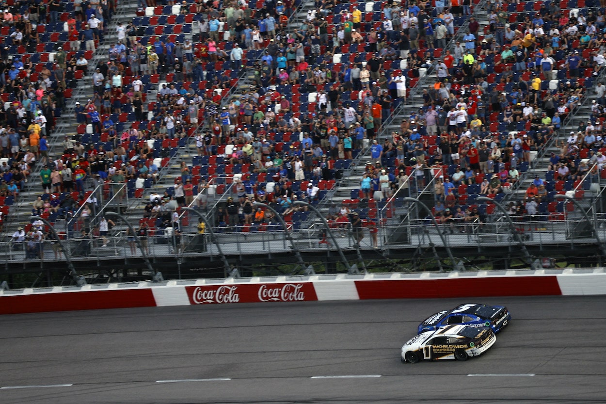 Ross Chastain and Kyle Larson race.