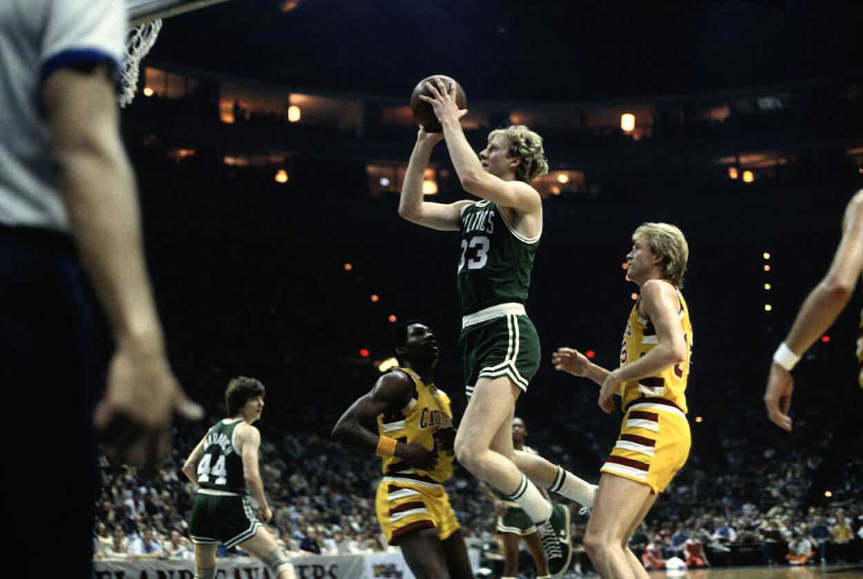 Larry Bird (C) puts up a shot during his time with the Boston Celtics.