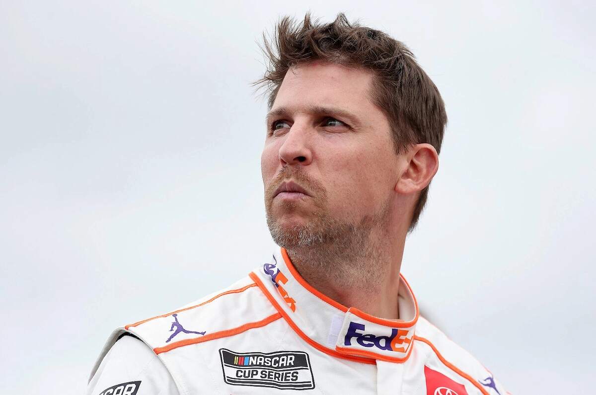 Denny Hamlin waits on the grid prior to the NASCAR Cup Series Foxwoods Resort Casino 301 at New Hampshire Motor Speedway on July 18, 2021