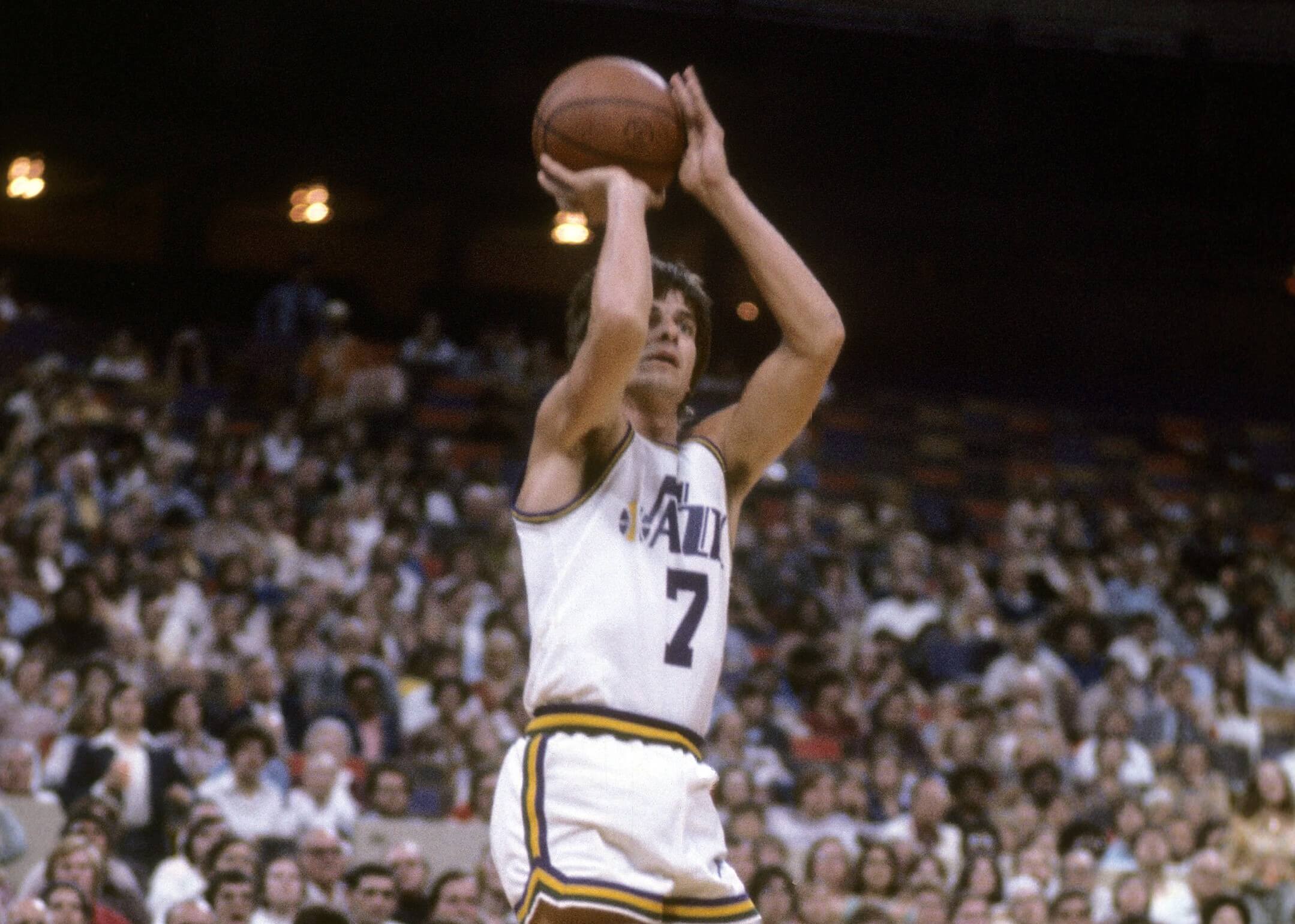Pete Maravich of the New Orleans Jazz in action shooting an outside shot.