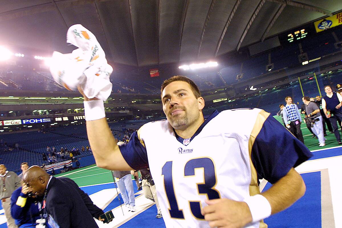 Quarterback Kurt Warner of the St. Louis Rams leaves the field after a 2001 game