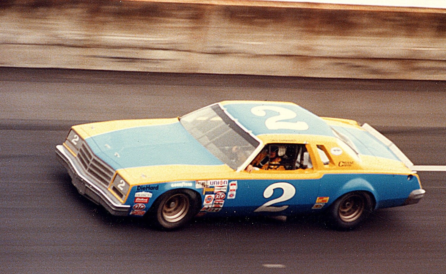 Dale Earnhardt drives to an eighth-place finish in the 1979 Daytona 500 in an unsponsored Rod Osterlund car. The crew chief was the legendary "Suitcase" Jake Elder.