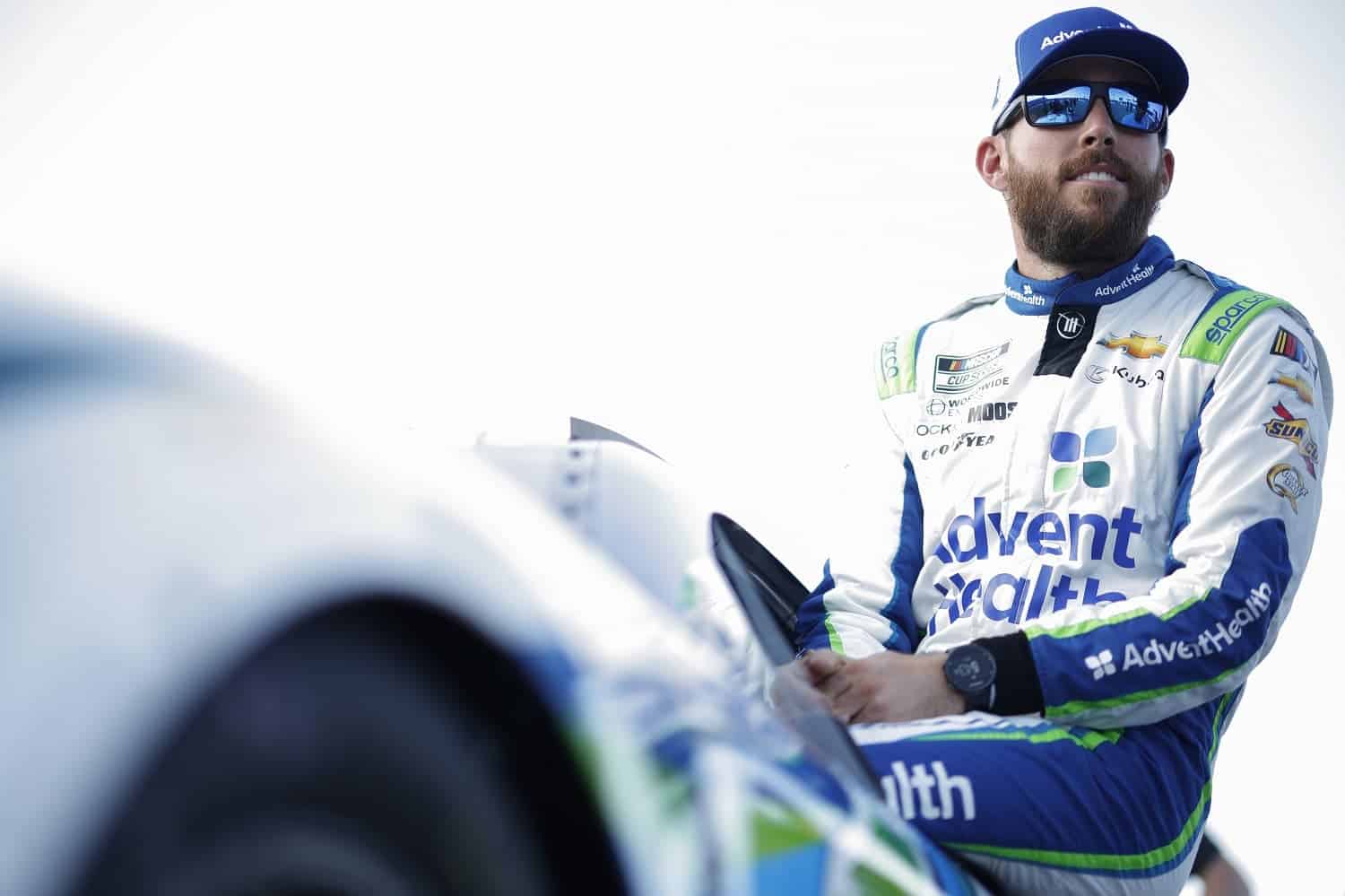 Ross Chastain enters his car during qualifying for the NASCAR Cup Series Advent Health 400 at Kansas Speedway on May 6, 2023.