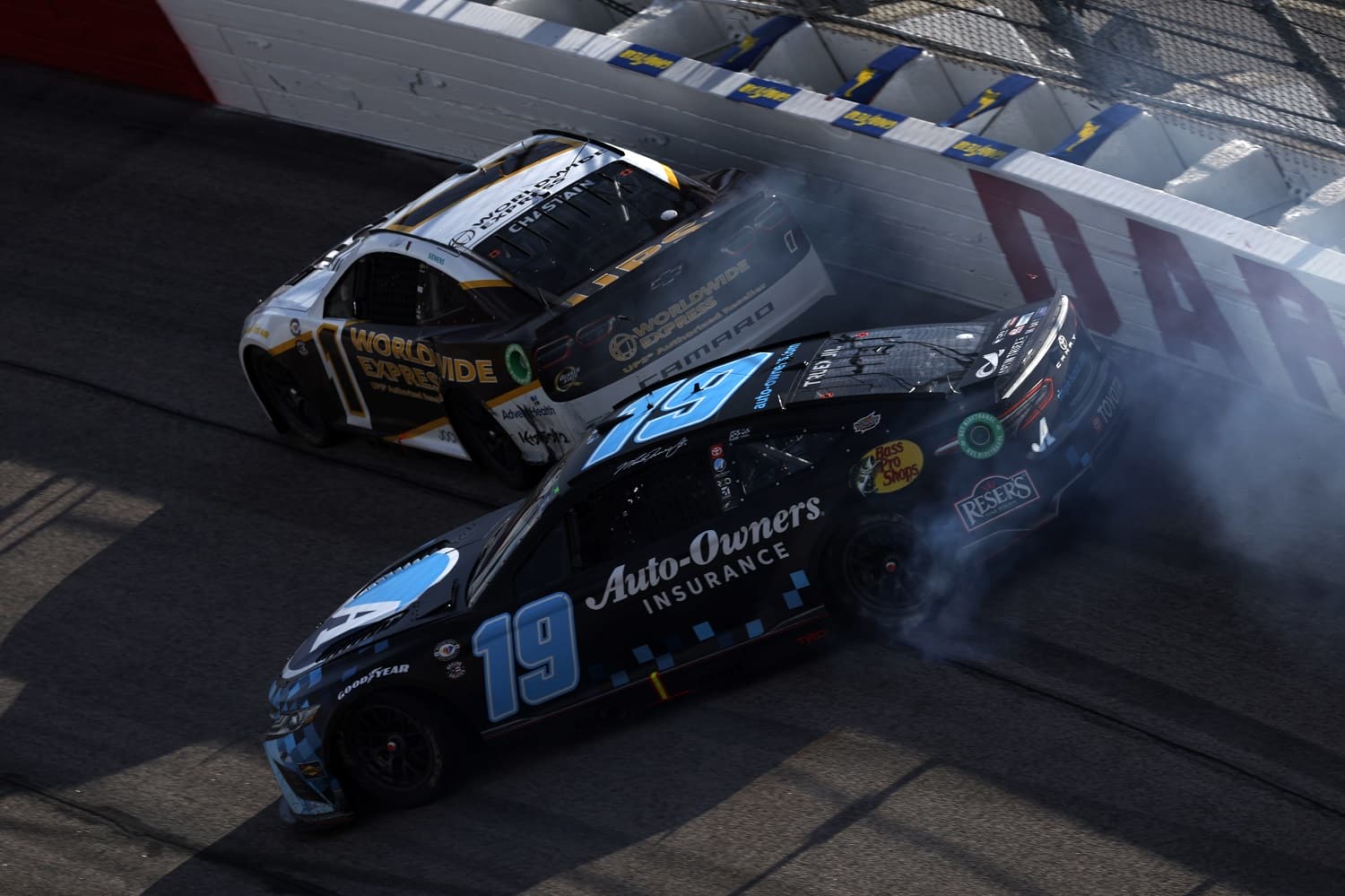 Martin Truex Jr. spins behind Ross Chastain late in the second stage of the NASCAR Cup Series Goodyear 400 at Darlington Raceway on May 14, 2023.