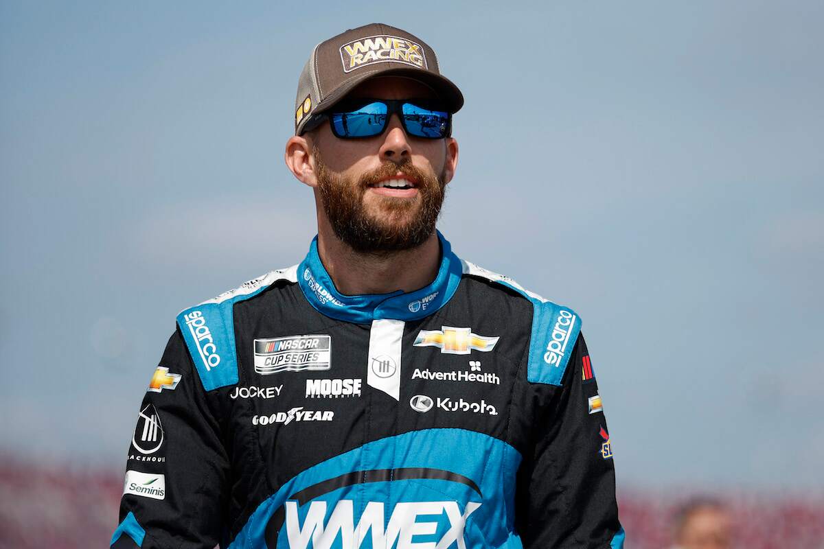 Ross Chastain, driver of the #1 Worldwide Express/UPS Chevrolet, walks the grid during practice for the NASCAR Cup Series Goodyear 400 at Darlington Raceway on May 13, 2023