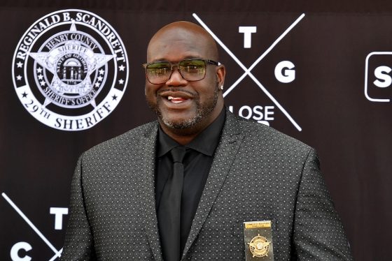 NBA star Shaquille O'Neal smiles at a 2021 media event