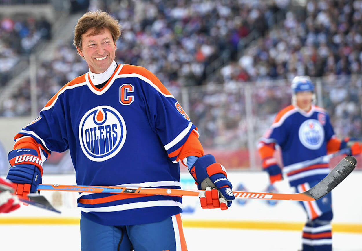 Wayne Gretzky skating with the Oilers alumni in 2016.