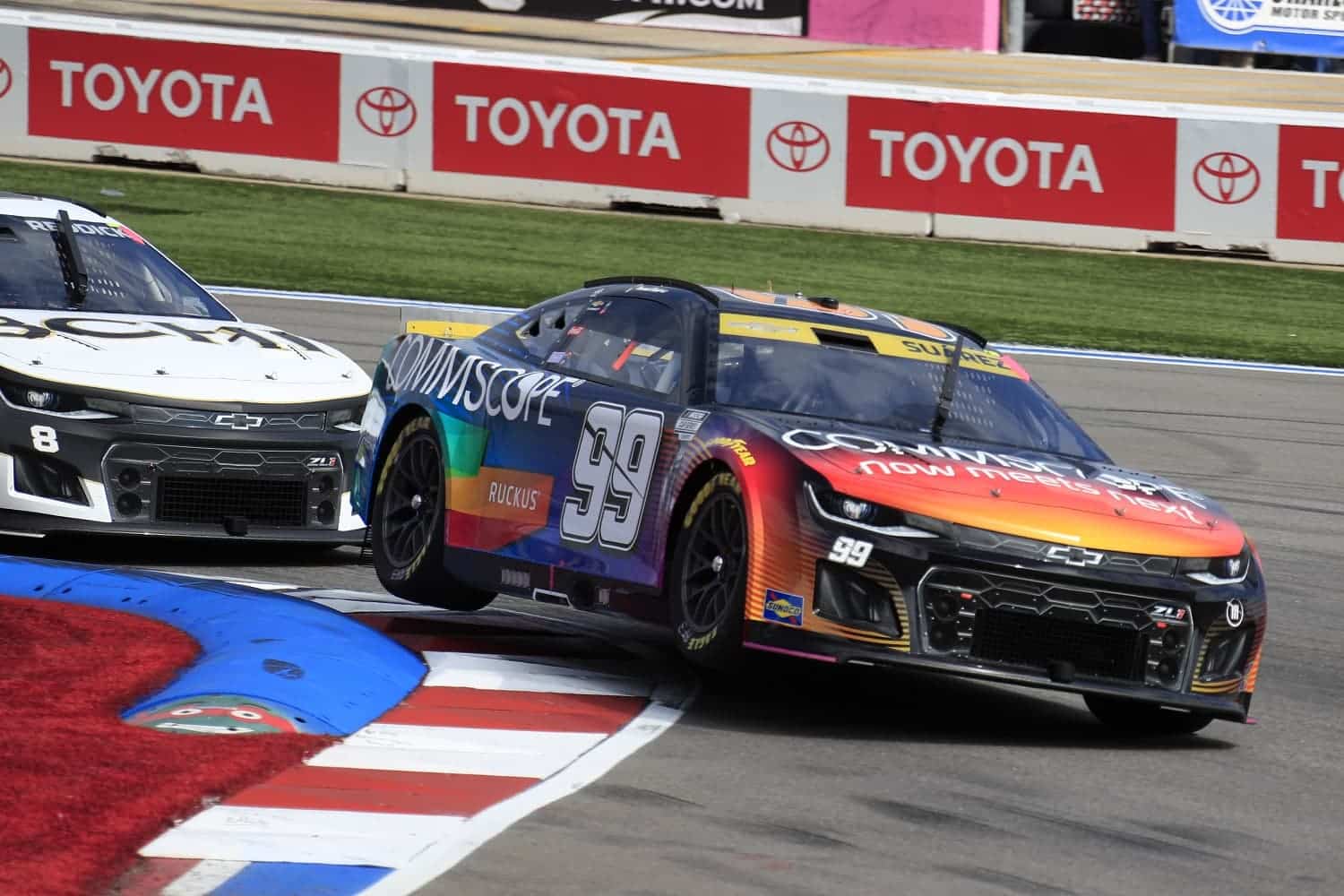 Daniel Suarez launches his car over the turtles in Turn 16 during the running of the Bank of America Roval 400 on Oct. 9, 2022 at Charlotte Motor Speedway.