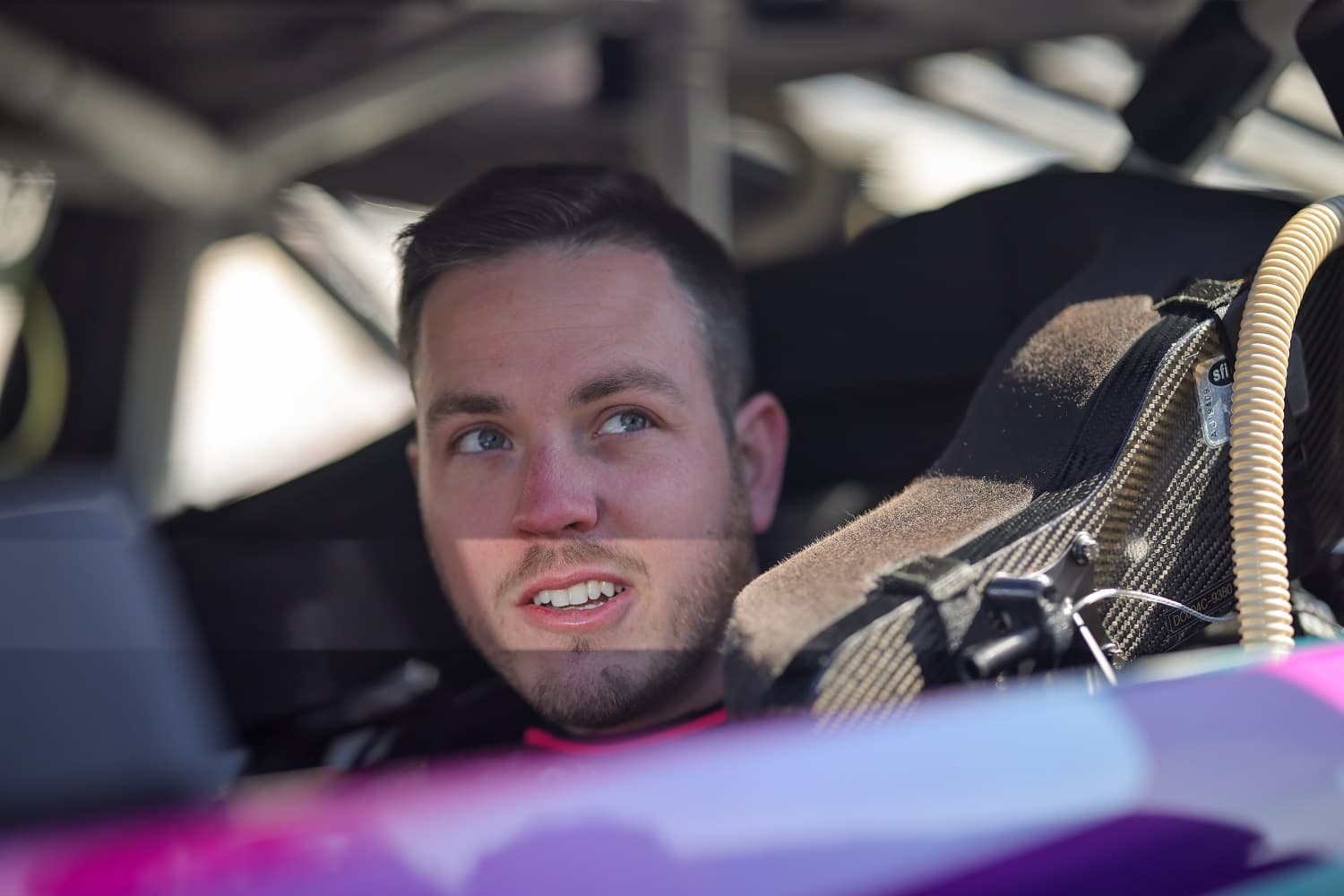 Alex Bowman sits in his No. 48 Chevy during qualifying for the NASCAR Cup Series Ambetter Health 400 at Atlanta Motor Speedway on March 18, 2023.
