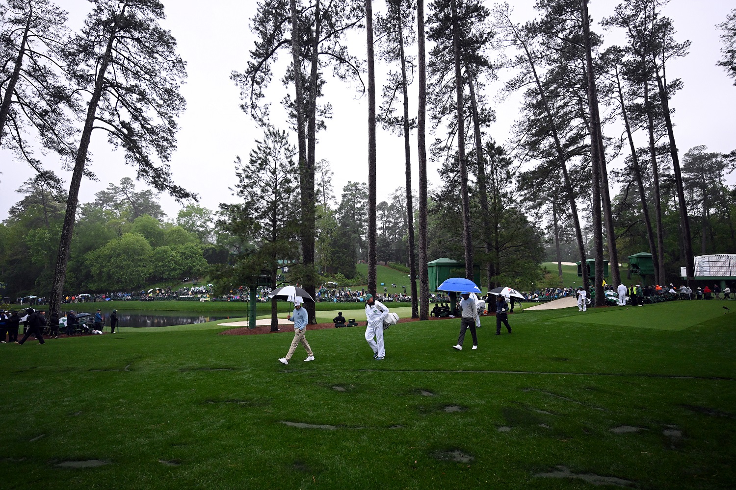 Players walk near the 17th hole during the second round of the 2023 Masters Tournament at Augusta National Golf Club on April 8, 2023 in Augusta, Georgia. | Ross Kinnaird/Getty Images