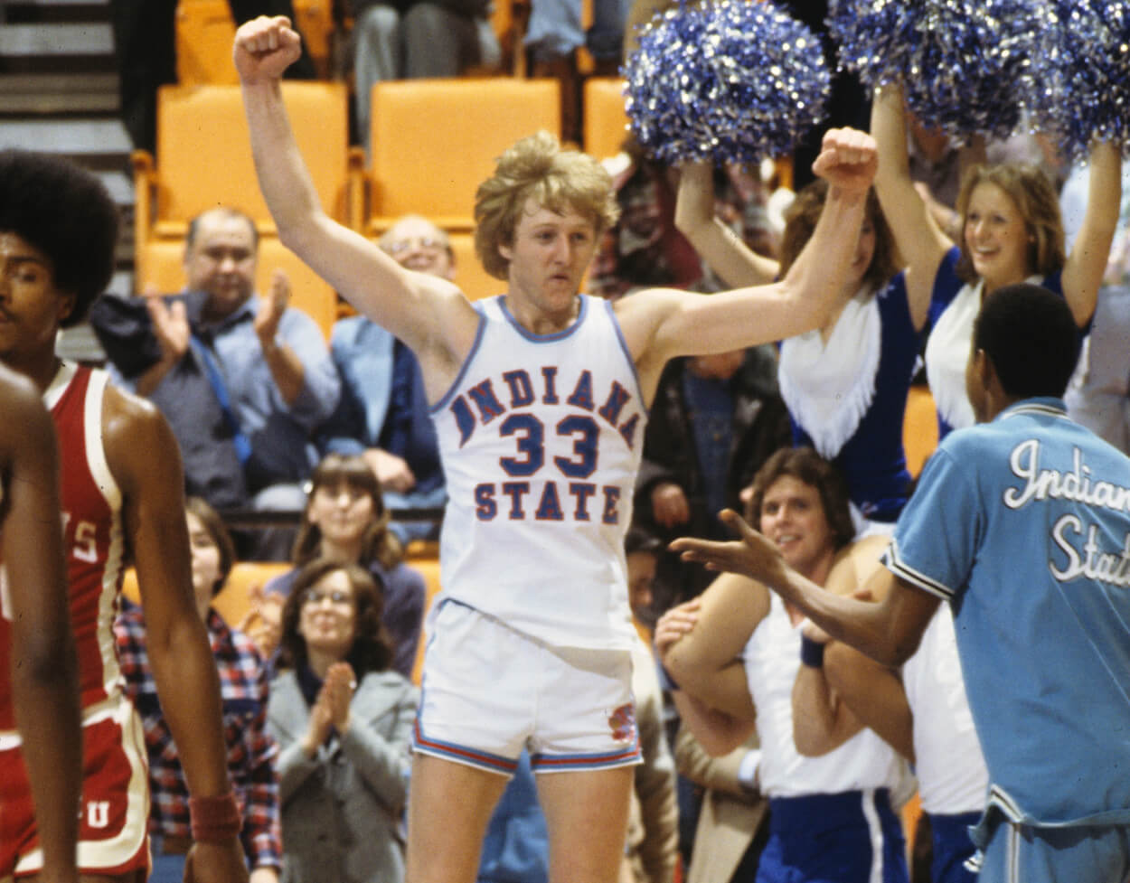 Larry Bird of the Indiana State Sycamores celebrates with a teammate.