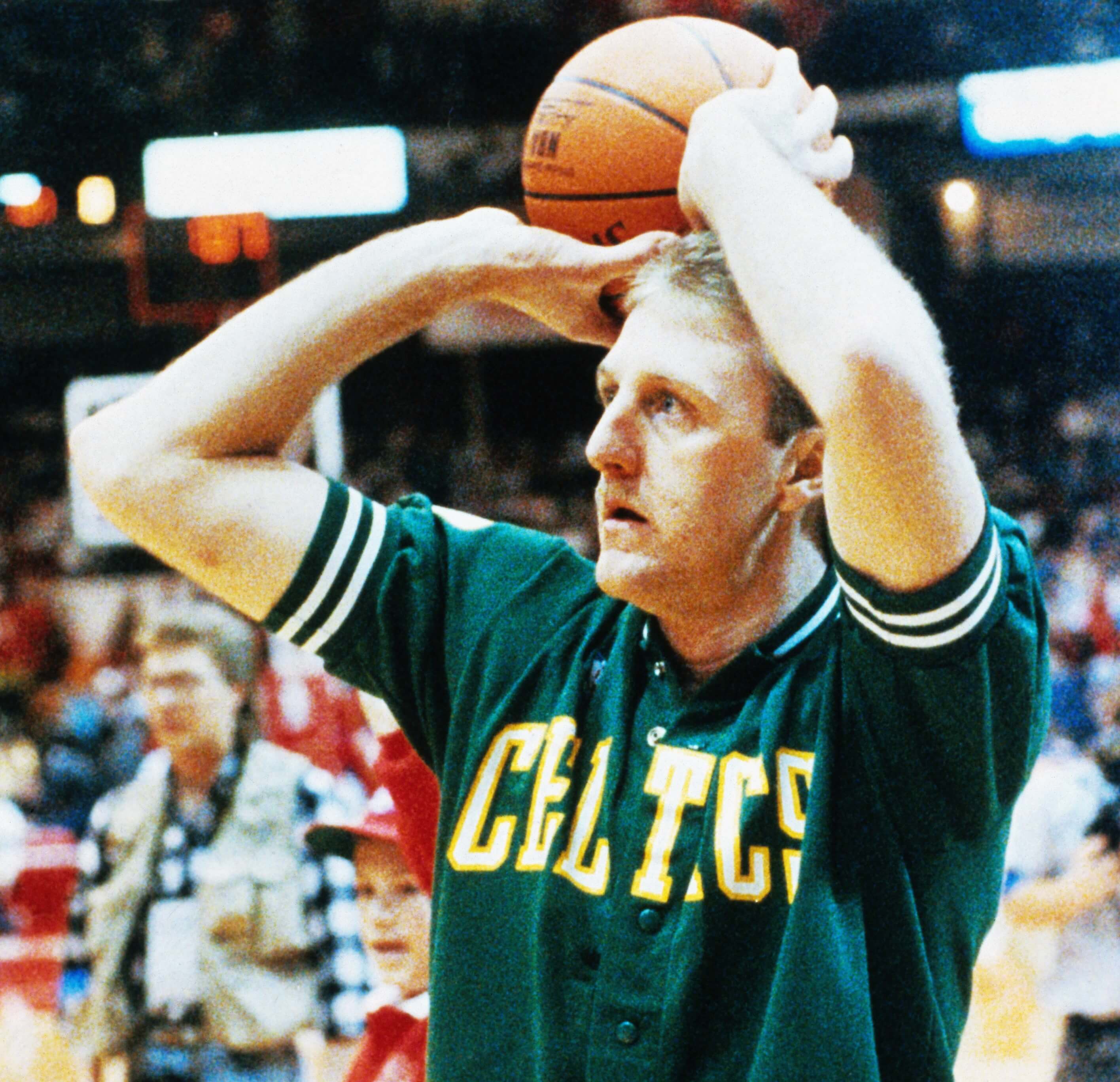 Larry Bird warms up during an NBA three-point contest.