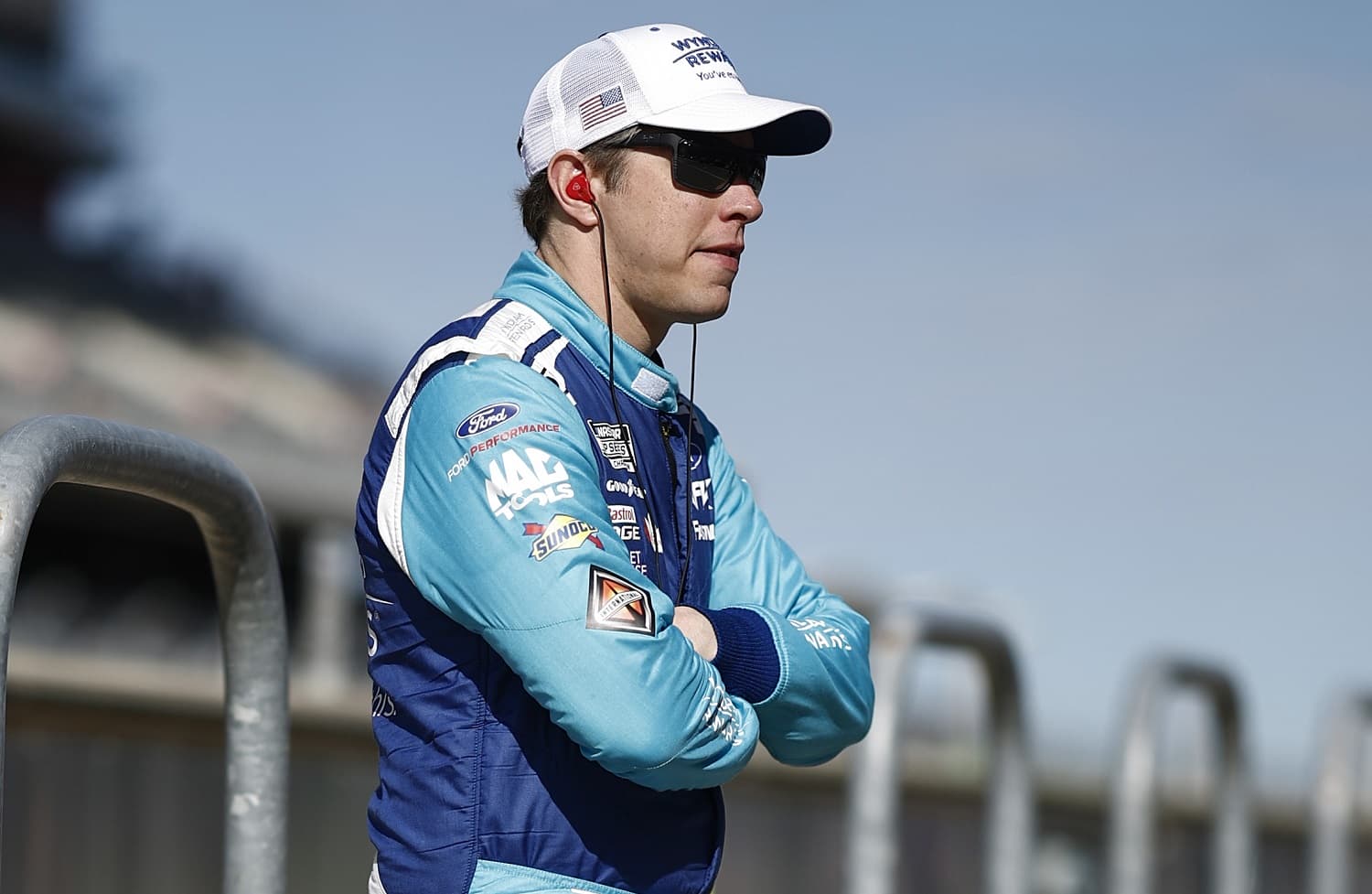 Brad Keselowski waits in the garage area during qualifying for the NASCAR Cup Series EchoPark Automotive Grand Prix at Circuit of The Americas on March 25, 2023 in Austin, Texas.