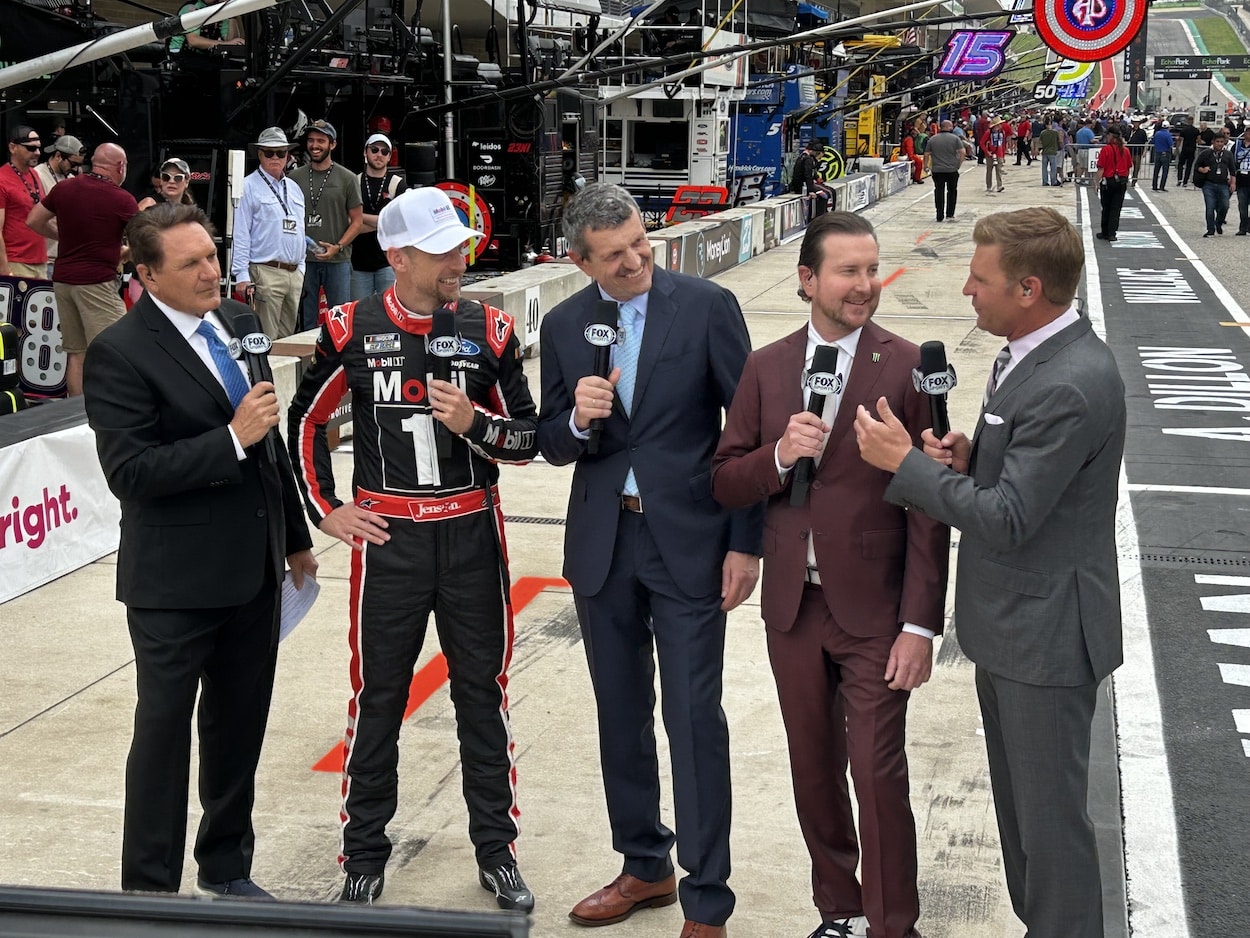 Clint Bowyer talks on pit road.