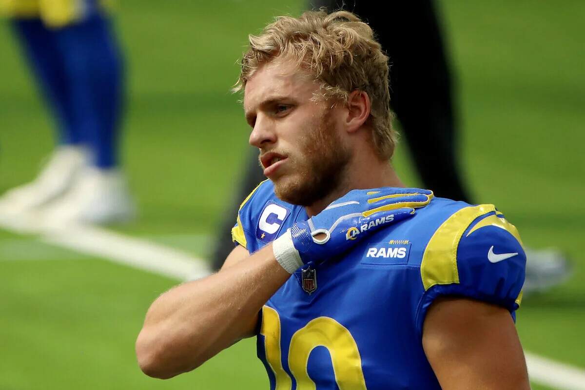 Cooper Kupp stretches his shoulder in 2020