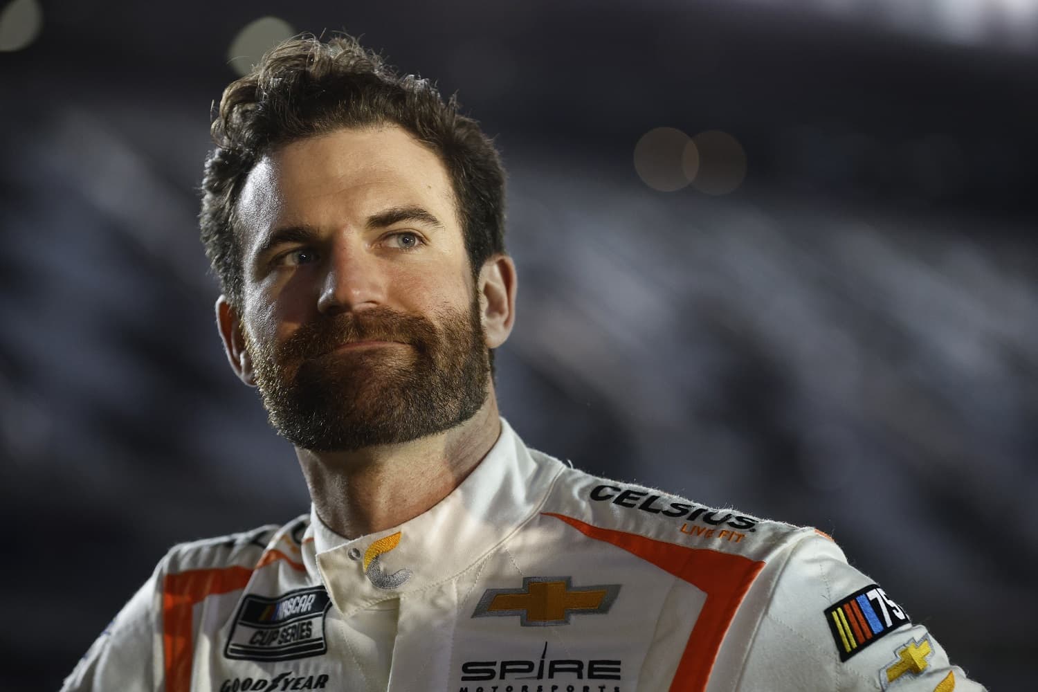 Corey LaJoie looks on during qualifying for the Busch Light Pole at Daytona International Speedway on Feb. 15, 2023.