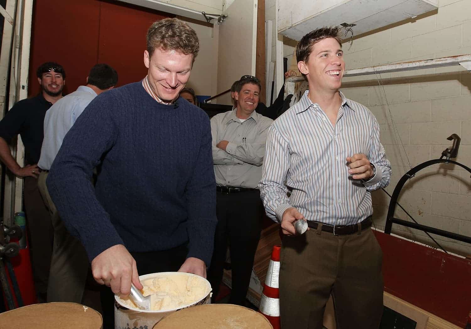 Dale Earnhardt Jr. and Denny Hamlin practice an ice cream throwing stunt backstage prior to their appearance on 'Live with Regis and Kelly' during the NASCAR Chase Media Tour on Sept. 10, 2008, in New York City. | Mike Stobe/Getty Images for NASCAR