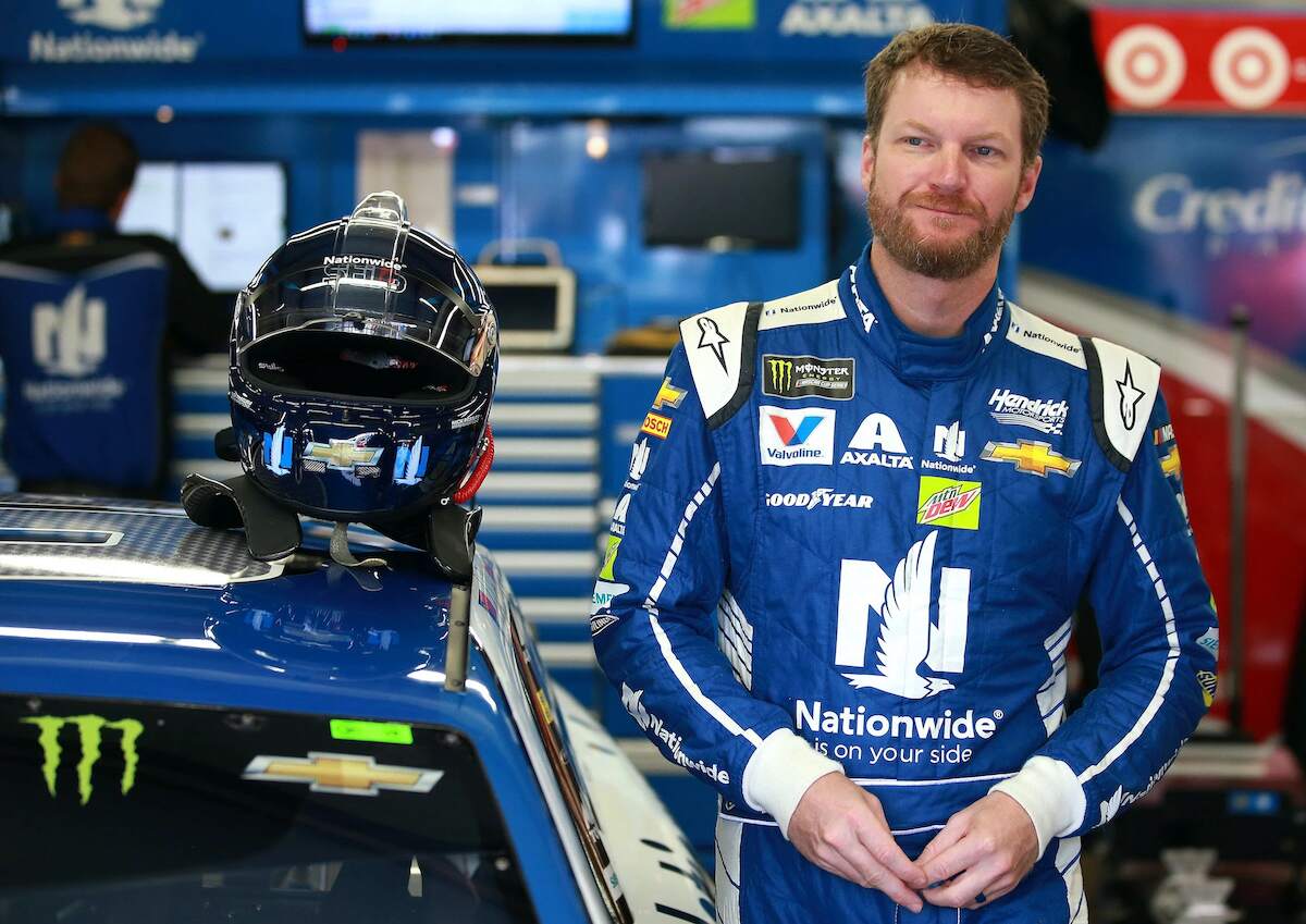 Dale Earnhardt Jr. rests against his Nationwide car