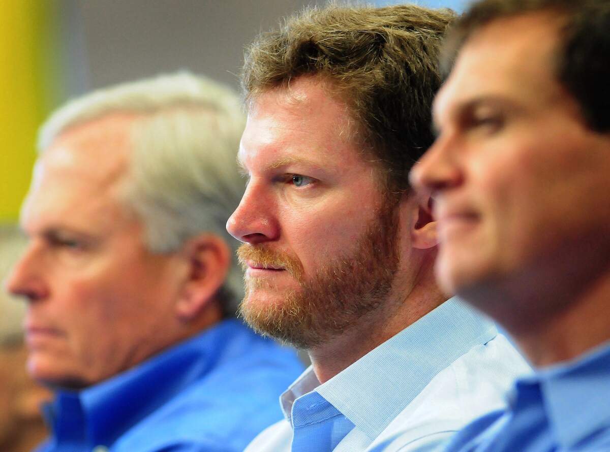 NASCAR team owner Rick Hendrick, NASCAR Sprint Cup Series driver Dale Earnhardt Jr., and his crew chief Steve Latarte listen to a question during a 2012 news conference