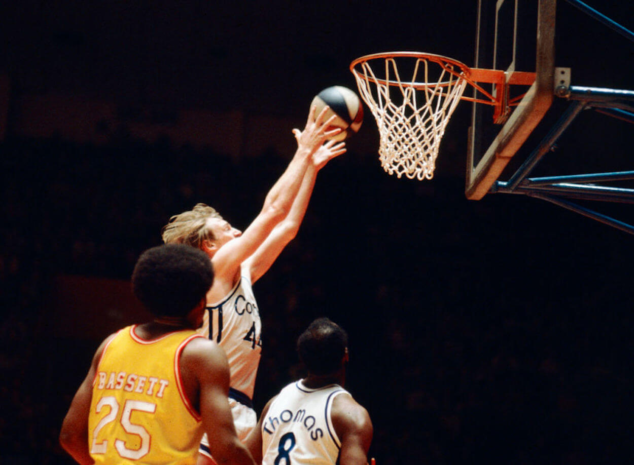 Dan Issel (C) goes up for a dunk as a member of the ABA's Kentucky Colonels.