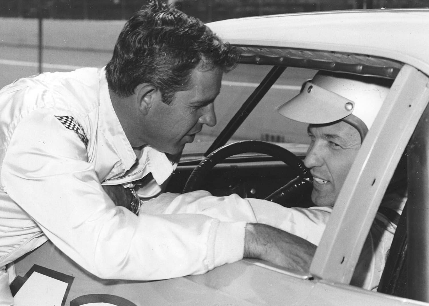 David Pearson and Richard Petty talk before a race in an undated photo. | ISC Archives/CQ-Roll Call Group via Getty Images