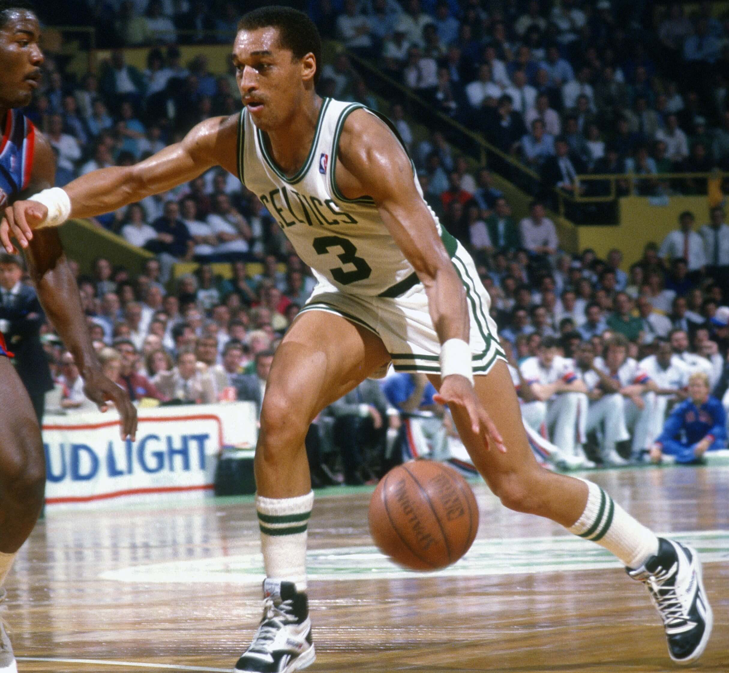 Dennis Johnson of the Boston Celtics drives on Joe Dumars of the Detroit Pistons.