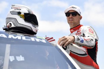Denny Hamlin enters his car prior to the NASCAR Cup Series Toyota / Save Mart 350 at Sonoma Raceway on June 11, 2023.