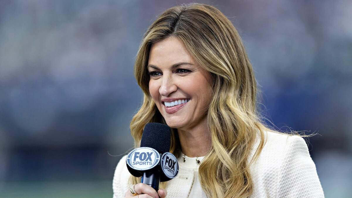 Media personality Erin Andrews smiles while broadcasting for Fox Sports