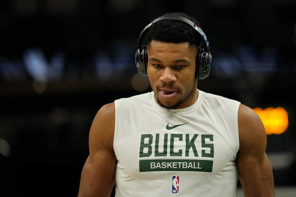 Giannis Antetokounmpo warms up before a game