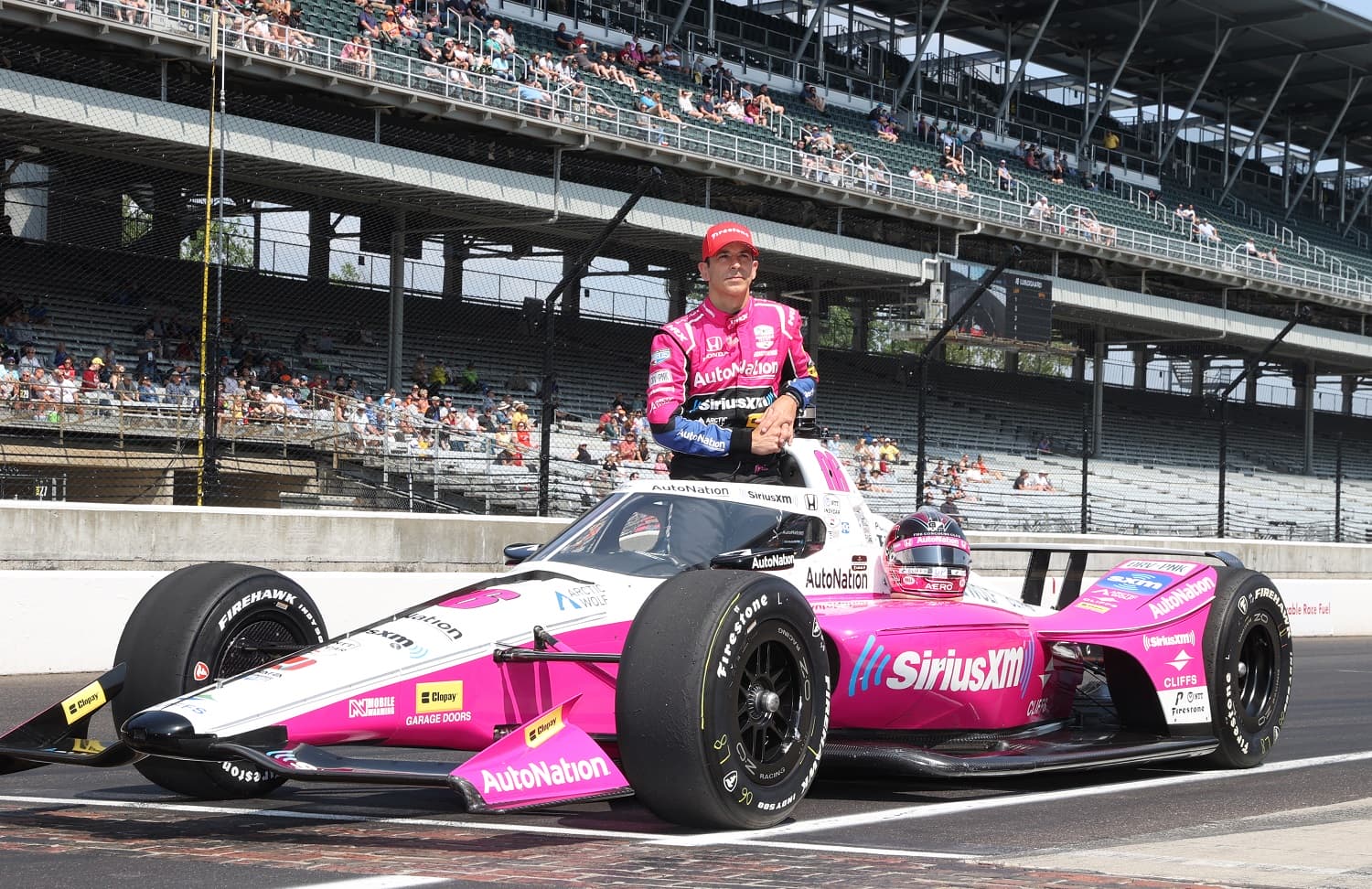 NTT IndyCar series driver Helio Castroneves poses for his official photo at the yard of bricks after qualifying for the 107th Indianapolis 500 on May 20, 2023. | Brian Spurlock/Icon Sportswire via Getty Images