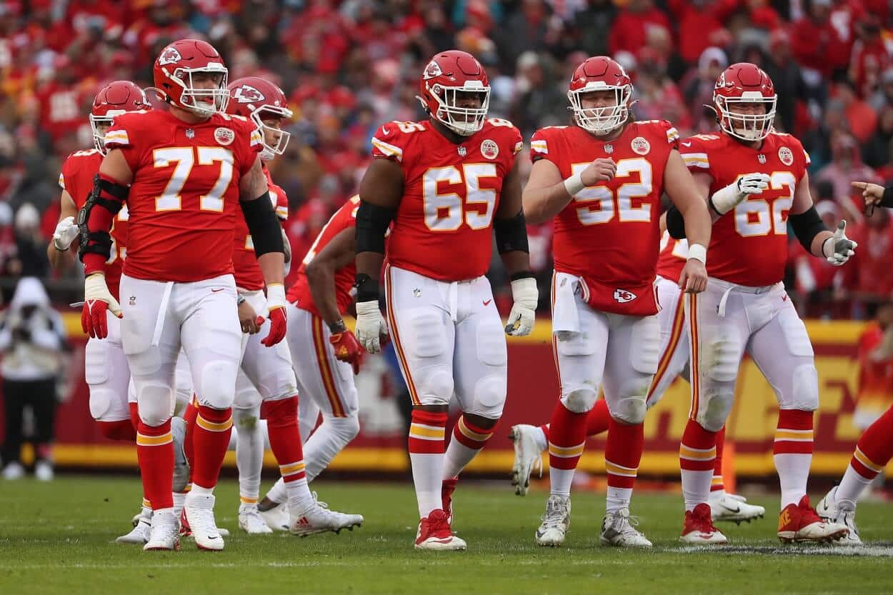 The Kansas City Chiefs offensive line in the first quarter of an AFC divisional playoff game between the Jacksonville Jaguars and Kansas City Chiefs on January 21, 2023 at GEHA Field at Arrowhead Stadium in Kansas City, MO