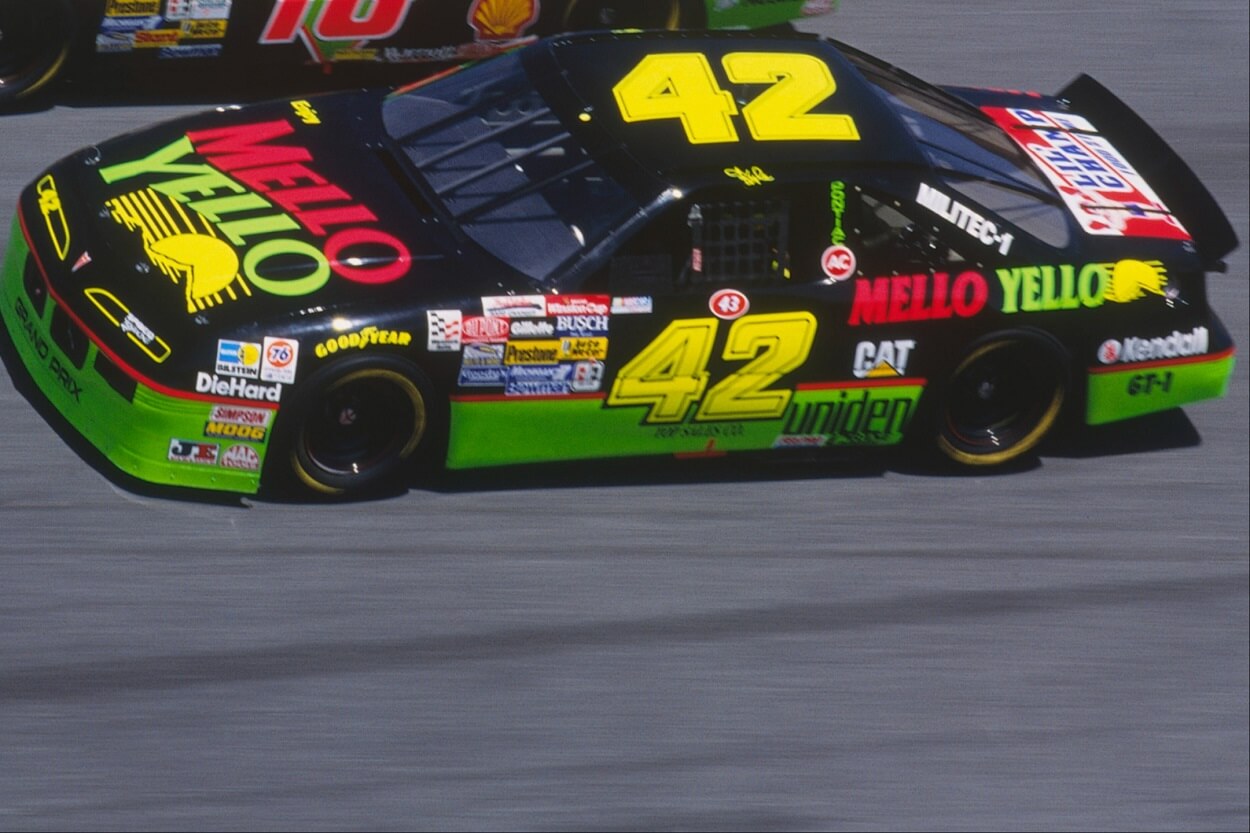 Dale Jarrett drives his Interstate Batteries #18 car down a turn against Kyle Petty in his Mello Yello #42 car during the Daytona 500 at the Daytona Speedway on February 14, 1993 in Daytona Beach, Florida